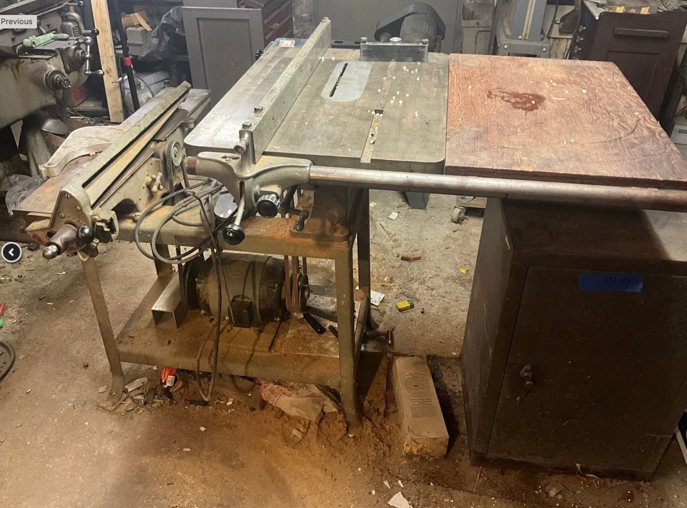 The saw as found, covered in sawdust and grime
